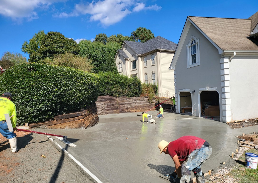 Long-lasting concrete driveway being professionally finished in Alexandria, LA